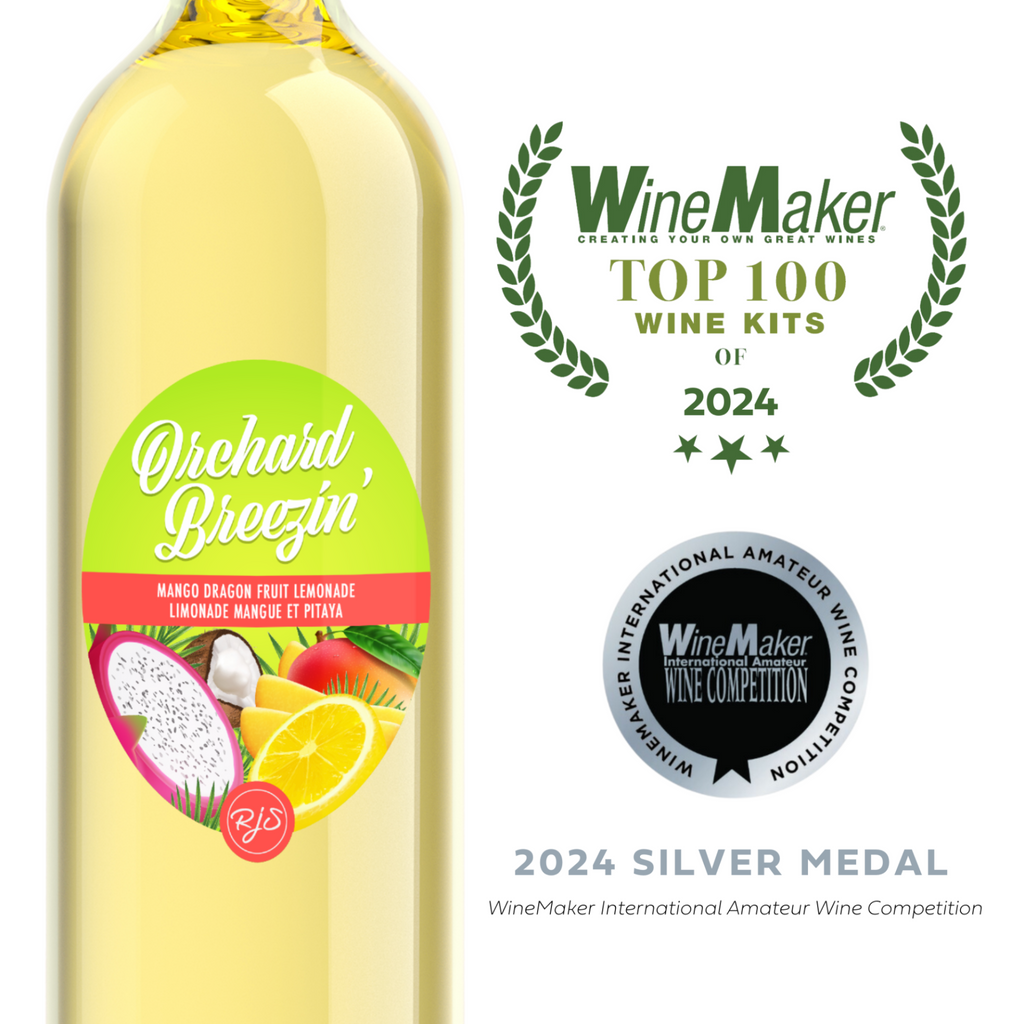 Bottle of Orchard Breezin' wine kit with awards on a white background